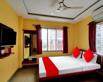 Goroomgo Hotel Shree Kolkata - Kolkata - Schlafzimmer