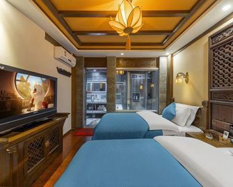 Lijiang Sifang Inn Guangyi Road - ליז'יאנג - חדר שינה