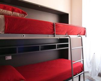 Luogo Comune Ostello - Brescia - Habitación