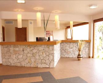 Fonte Arcada - Villa Gesell - Front desk