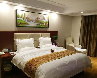 Greentree Inn Suqian Sihong Passenger Station Zhongyuan Logistics District Hotel - Suqian - Bedroom