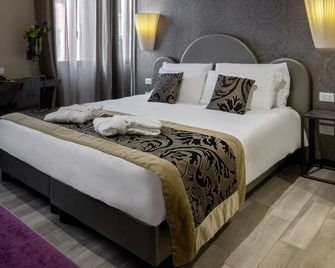 Alle Guglie Boutique Hotel - ונציה - חדר שינה