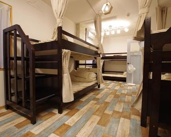 سينامون جيستهاوس دوغو - هوستل - ماتسوياما - غرفة نوم