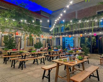 Noong Oi Homestay & Restaurant Moc Chau - Moc Chau - Building