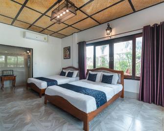 Capital O 805 Suan Palm Farm Nok Resort - Chachoengsao - Спальня