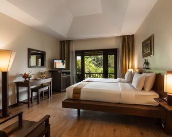 Lanna Dusita Riverside Boutique Resort - צ'אנג מאי - חדר שינה