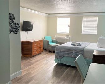 Apm Inn & Suite - Jacksonville - Bedroom