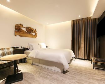 Centralperson Pyeongtaek Hotel - Pyeongtaek - Habitación