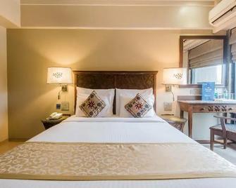 Maharaja Hotel - Utan - Bedroom