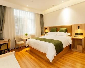 Greentree Inn Express Bozhou Woyang County Huaizhong Avenue Zhonghai International - Bozhou - Schlafzimmer