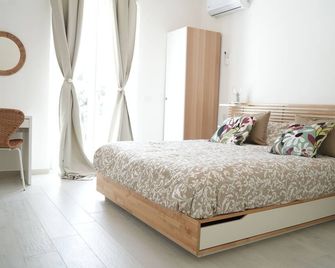 بارك رووم بي آند بي - إيشيا - غرفة نوم