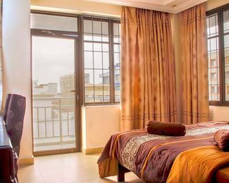 Sleep Inn Hotel Kariakoo - Dar Es Salaam - Bedroom
