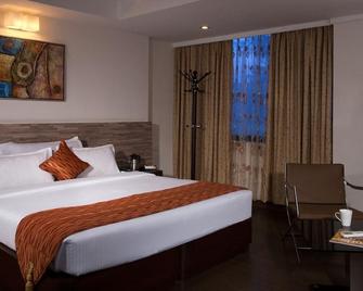 Hotel Metro Park Inn - Coimbatore - Schlafzimmer