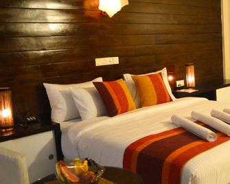 Green Grass Hotel & Restaurant - Jaffna - Schlafzimmer