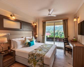 Cygnett Resort Mountain Breeze - Nainital - Phòng ngủ
