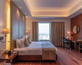 Pride Plaza Hotel, Kolkata - כלכולתה - חדר שינה