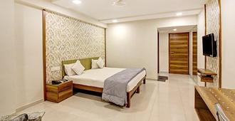 Hotel Prudent - Vadodara - Schlafzimmer