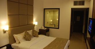 Hotel Surya - Vadodara - Bedroom