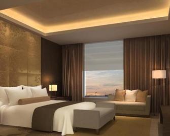 Holiday Inn Nantong Oasis International - Nantong - Yatak Odası