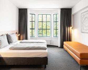 LA serviced apartments - Landshut - Yatak Odası