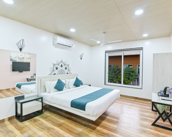 Elegant Waterfront Resort - Induri - Habitación