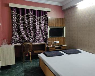 Hotel Marina Inn - Dhanbād - Bedroom
