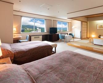 AMMS Hotels Kusatsu Onsen Hotel Resort - Kusatsu - Slaapkamer