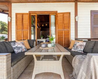Chalet Tropical 3 by Interhome - Riumar - Patio