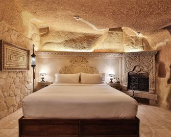 Elika Cave Suites Cappadocia, Curio Collection by Hilton - Nevşehir - Yatak Odası