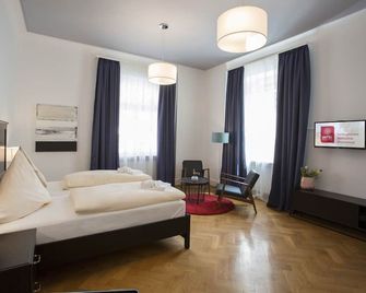 Hotel Mille Stelle City - היידלברג - חדר שינה