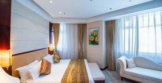 Beijing Palace Soluxe Hotel Astana - Astana - Bedroom