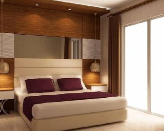 Marcan Resort Hotel - אולודניז - חדר שינה