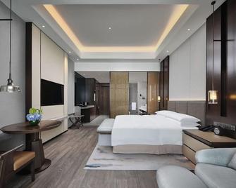 Primus Hotel Jiaxing - Jiaxing - Schlafzimmer