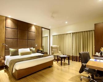 Express Towers Hotel - ואדודרה - חדר שינה