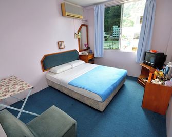 Hotel Lutana - סאנדאקן - חדר שינה