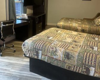 Whispering Pines Motel - אשוויל - חדר שינה