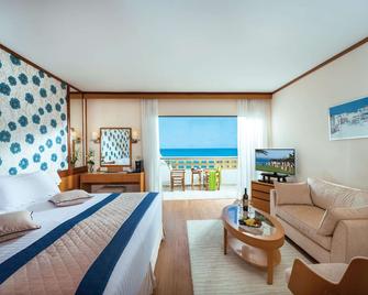 Constantinou Bros Athena Royal Beach Hotel - Pafos - Habitación