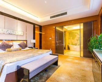 New Century Grand Hotel Siyang - Suqian - Bedroom