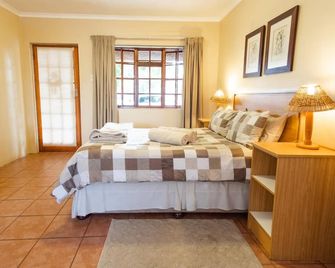 تريتوبس جست هاوس - بورت إليزابيث - غرفة نوم