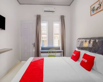 Hotel O Wisma Bambu Syariah - Bandar Lampung - Makuuhuone
