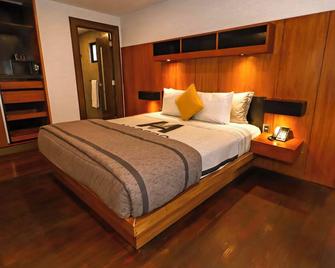 ماديرو هوتل آند سويتس - لا باز - غرفة نوم