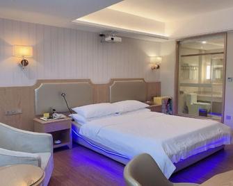 Liyang Hotel - Cantón - Habitación