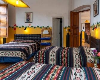 Hostal Riviera Sucre - Otavalo - Camera da letto