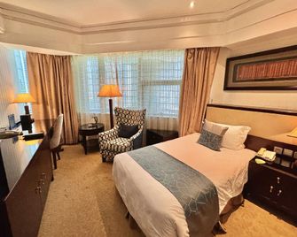 Baoan Hotel - Shanghai - Bedroom