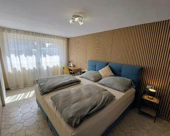 Buk City Apartments - Buk - Sypialnia