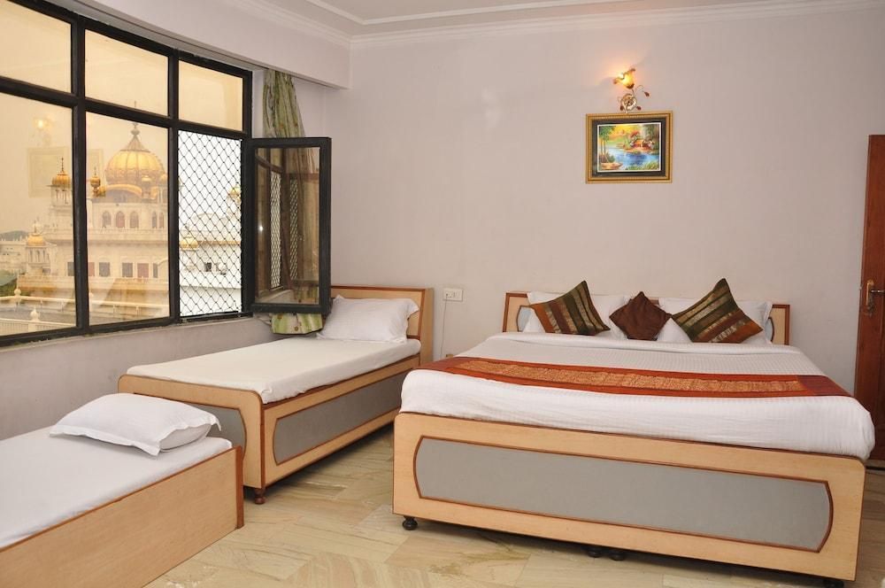 Hotel Mercury Inn By Sonachi - אמריצר - חדר שינה