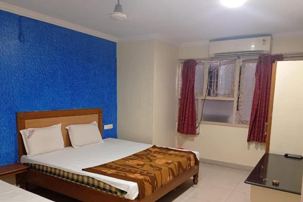Hotel Lakshmi Residency - ויסאקאפאטנם - חדר שינה