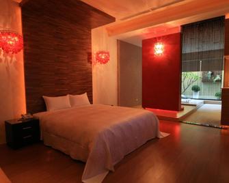 Qin Hai Motel - Mingjian Township - Bedroom
