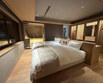 Hotel Obokekyo Mannaka - Miyoshi - Sypialnia