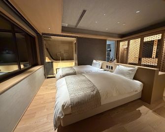 Hotel Obokekyo Mannaka - Miyoshi - Schlafzimmer